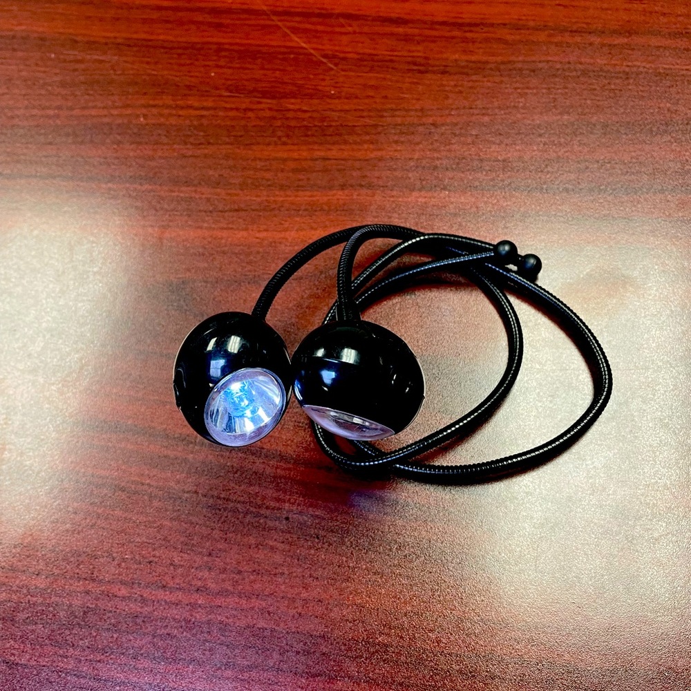 Two flexible flashlights/book lights